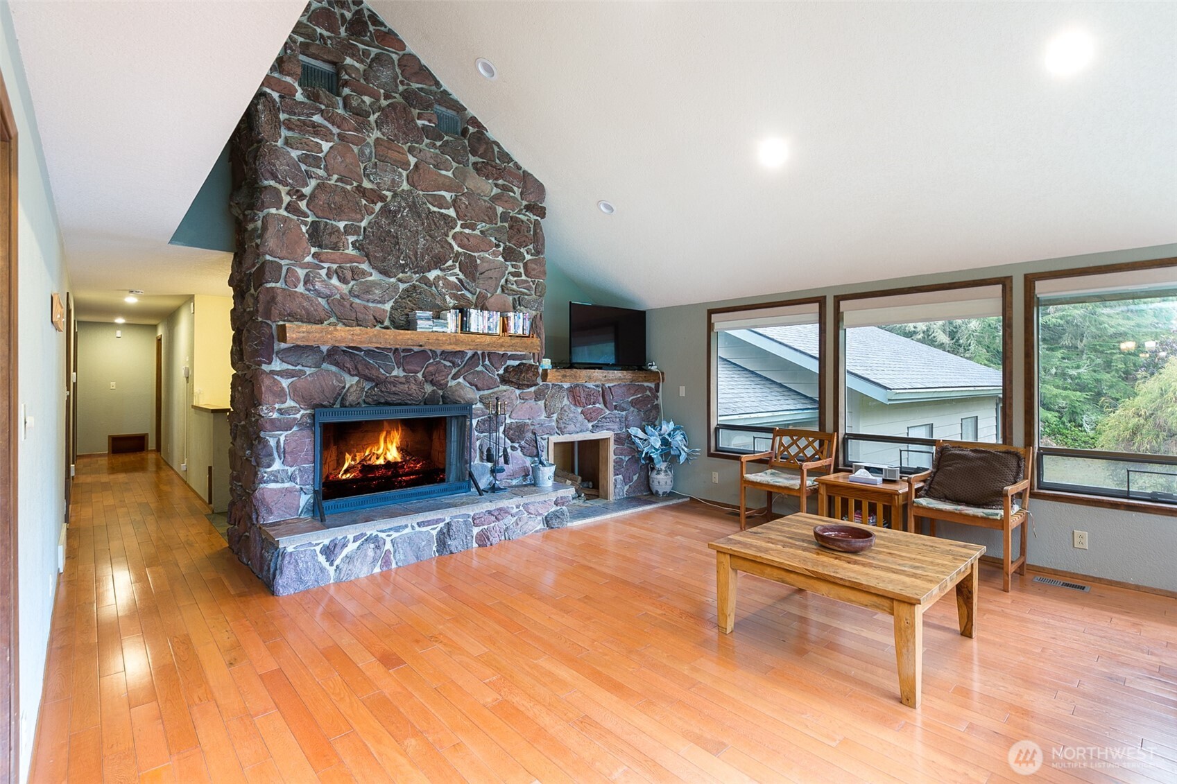 3547 Deer Park Road Port Angeles, WA 98362 - Photo 10 of 37 a living room with furniture and a fireplace
