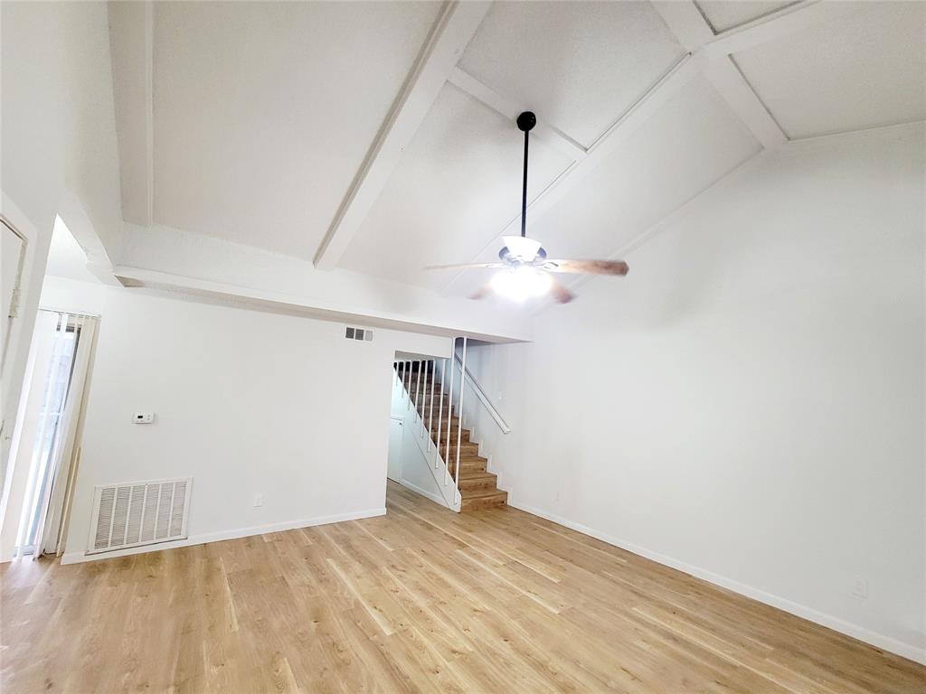 735 Arrowhead Circle Garland, TX 75043 - Photo 10 of 20 a view of empty room with wooden floor