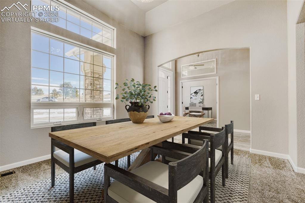 13680 Woodlake Road Elbert, CO 80106 - Photo 13 of 47 a view of a dining room with furniture