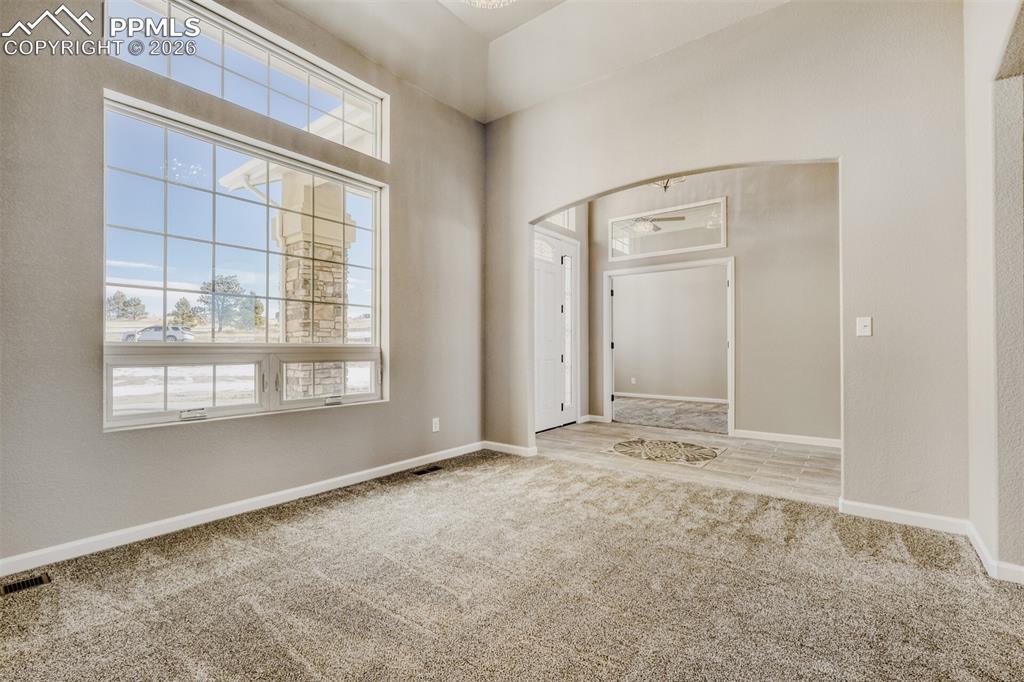 13680 Woodlake Road Elbert, CO 80106 - Photo 14 of 47 an empty room with windows