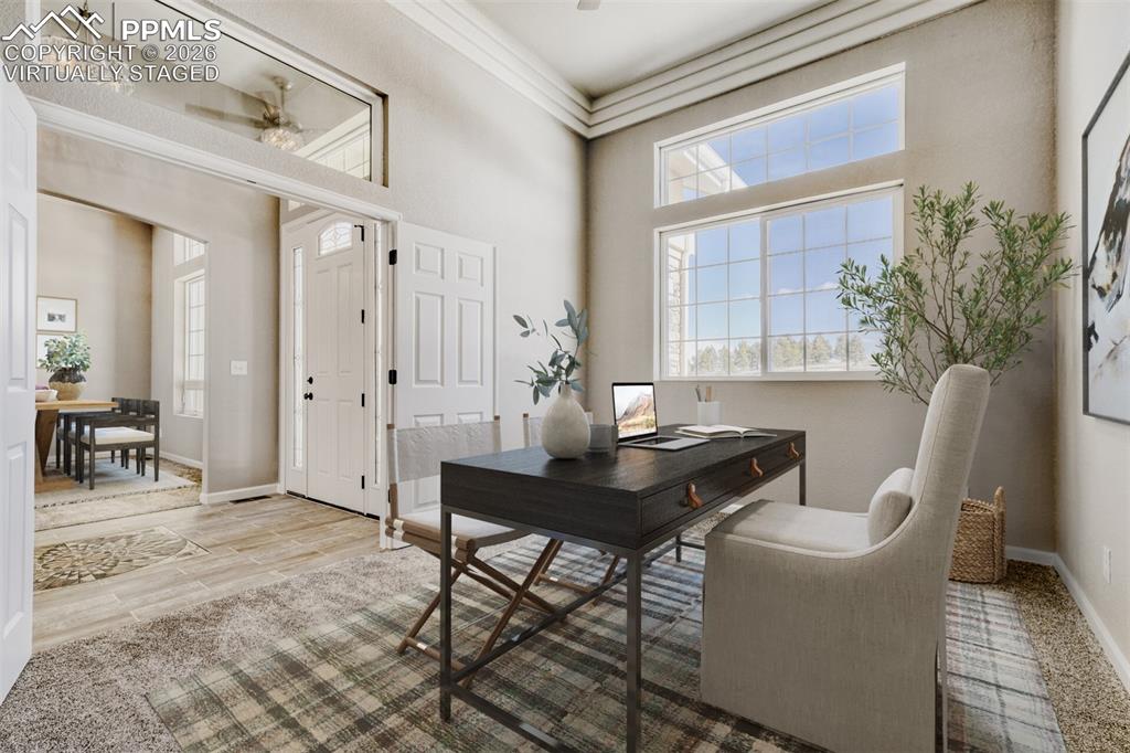 13680 Woodlake Road Elbert, CO 80106 - Photo 15 of 47 a view of a livingroom with furniture and window