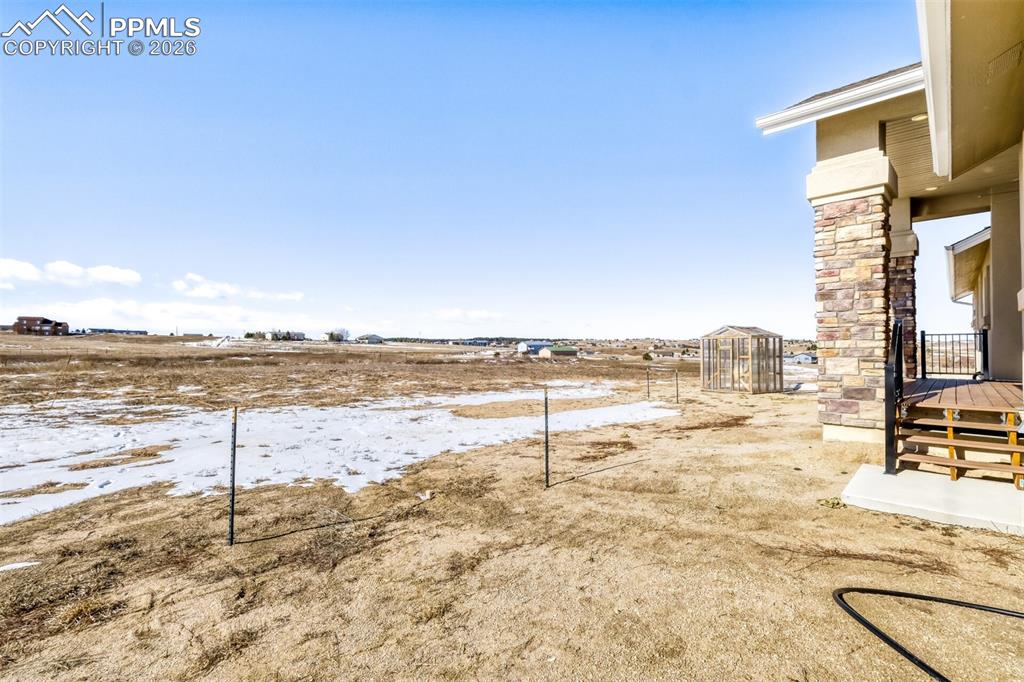 13680 Woodlake Road Elbert, CO 80106 - Photo 31 of 38 a view of an ocean and beach