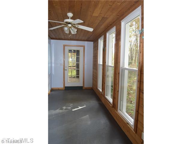 860 White Dirt Road Dobson, NC 27017 - Photo 6 of 16 Sunroom.