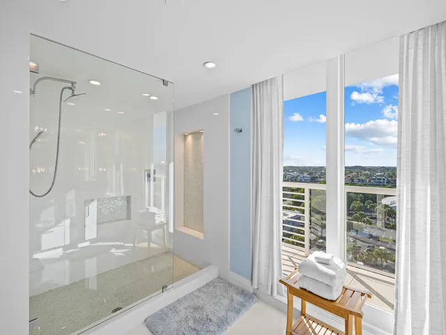 a spacious bathroom with a granite countertop sink and a mirror
