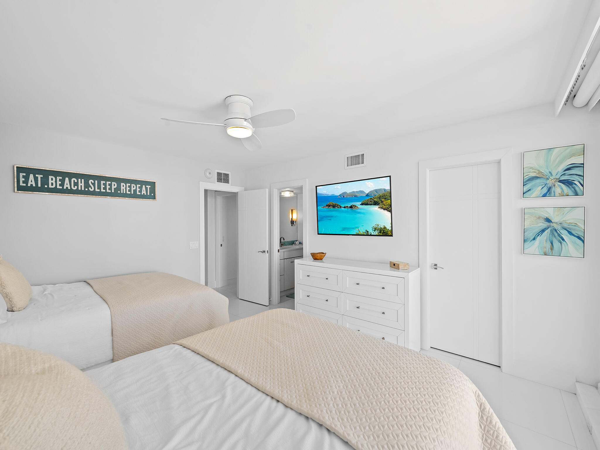 3505 South Ocean Boulevard, Unit 10N Highland Beach, FL 33487 - Photo 26 of 42 a bedroom with a bed and painting on the wall