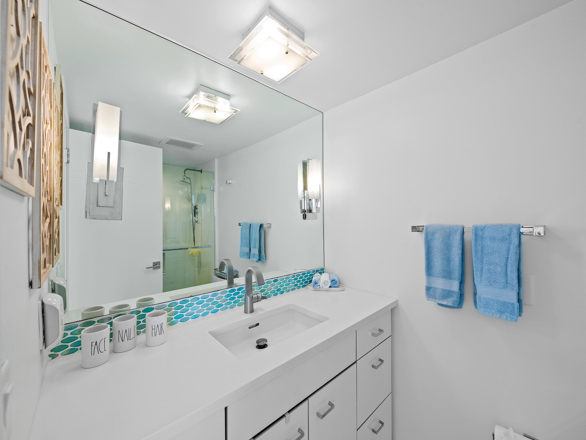 3505 South Ocean Boulevard, Unit 10N Highland Beach, FL 33487 - Photo 27 of 42 a bathroom with a sink and a mirror