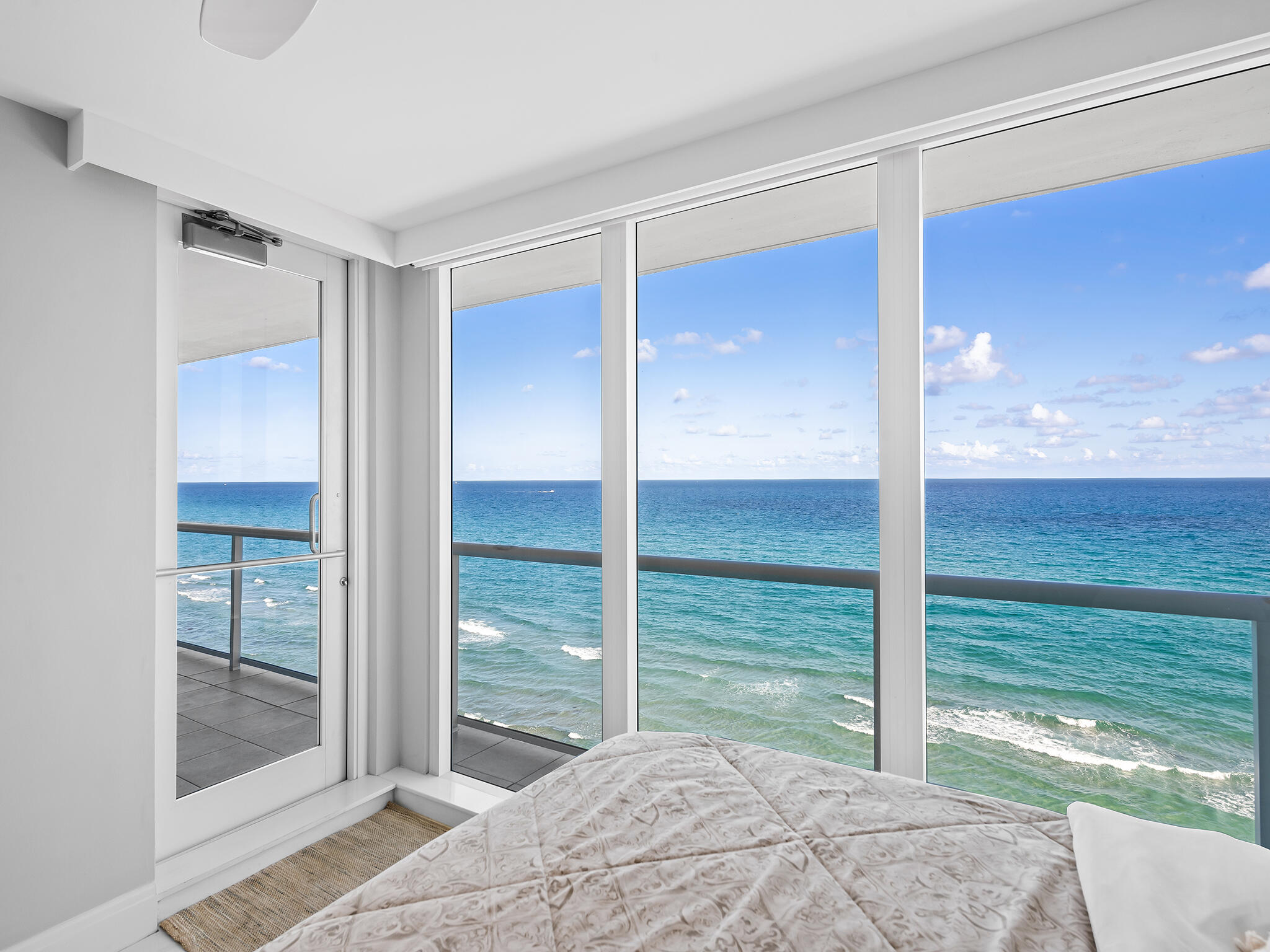 3505 South Ocean Boulevard, Unit 10N Highland Beach, FL 33487 - Photo 30 of 42 a bedroom with a bed and balcony view
