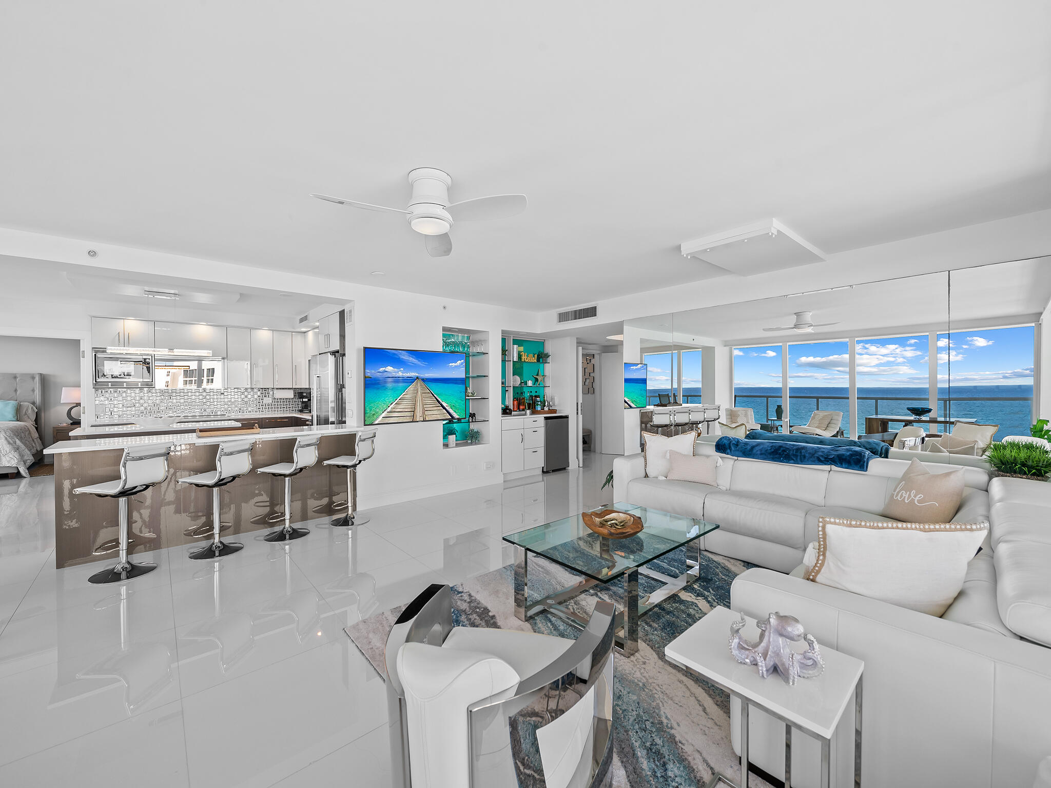 3505 South Ocean Boulevard, Unit 10N Highland Beach, FL 33487 - Photo 7 of 42 a living room with furniture and a table