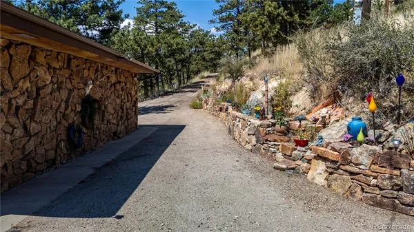 a view of a pathway with a bench