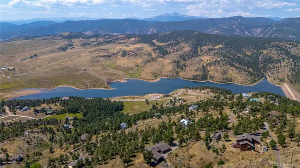 a view of mountain view with mountains in the background