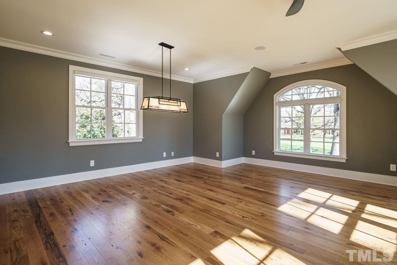 404 East Whitaker Mill Road Raleigh, NC 27608 - Photo 54 of 63 a view of an empty room and window