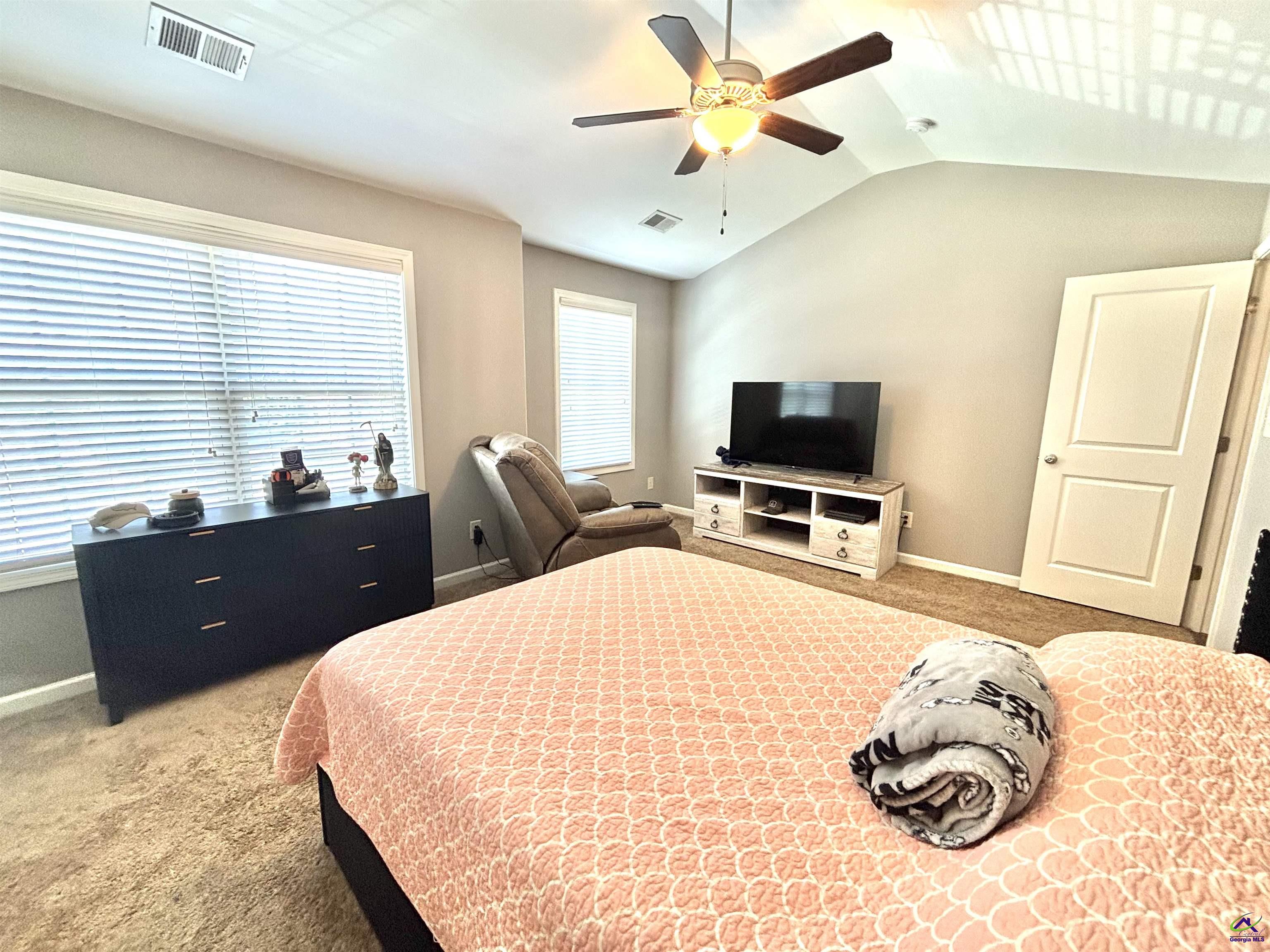 600 Post Oak Way Warner Robins, GA 31088 - Photo 41 of 50 a bedroom with a bed and a flat screen tv