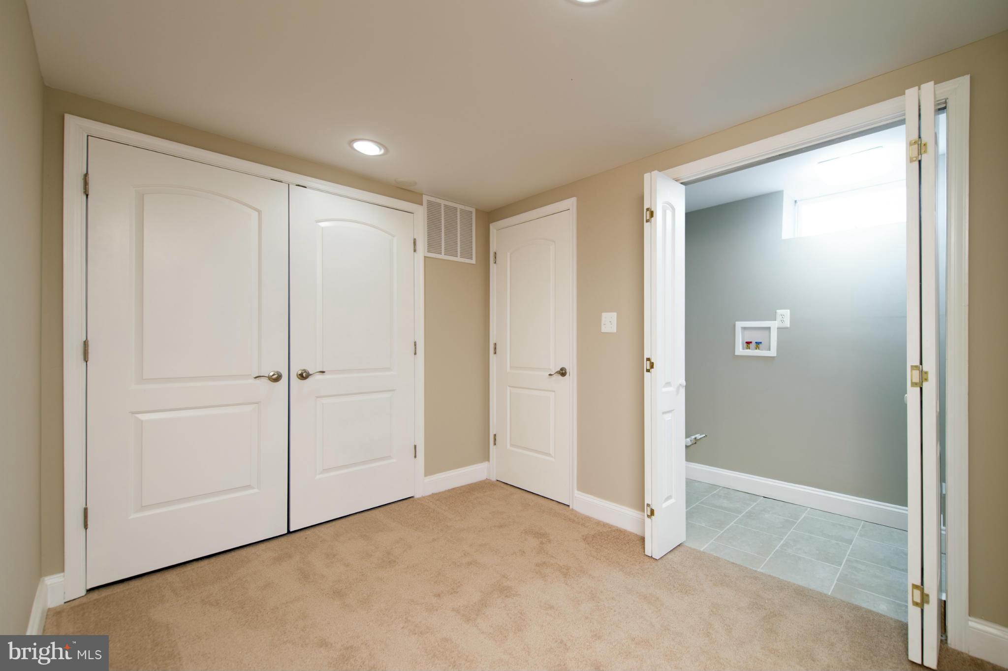 10111 Lyons Mill Road Randallstown, MD 21133 - Photo 21 of 28 Basement Laundry area