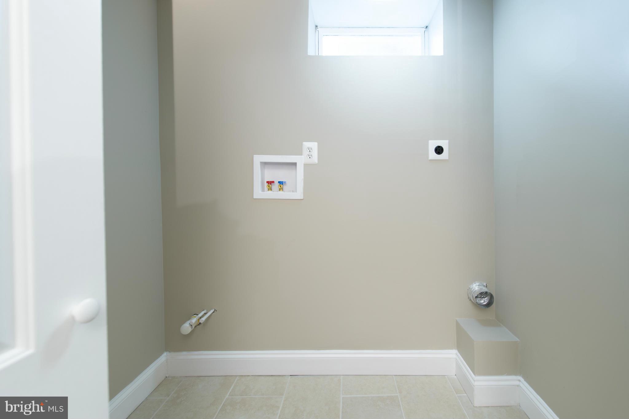 10111 Lyons Mill Road Randallstown, MD 21133 - Photo 26 of 28 Basement Laundry