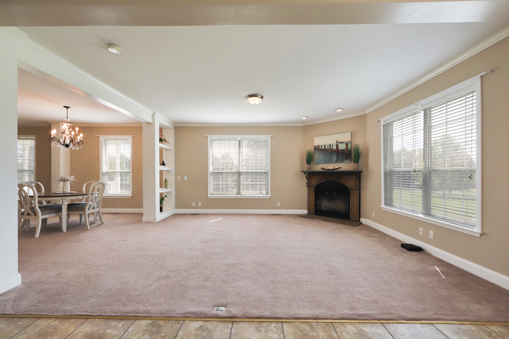 5721 B Hebron Road Lebanon, TN 37090 - Photo 14 of 34 a big room with windows and chandelier