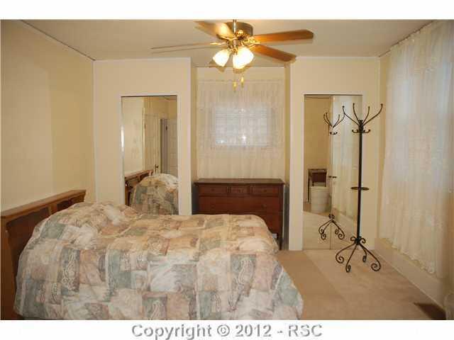 110 West Cheyenne Road Colorado Springs, CO 80906 - Photo 8 of 25 Master bedroom in the main house, has three closets. 2 Mirror coat size closets and a third coat size closet as well. Master is adjacent to a private bath, large linen closet and washer dryer that conveys with the home.