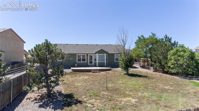 9061 Tompkins Road Peyton, CO 80831 - Photo 2 of 27 back yard