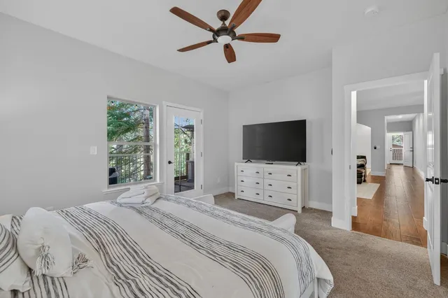 a view of a two chairs in the balcony