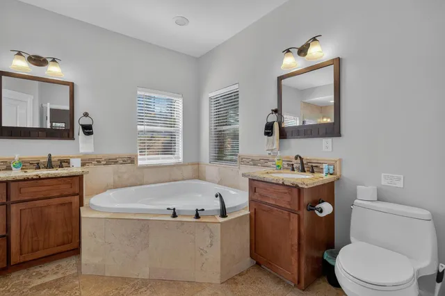 a view of a balcony with chairs