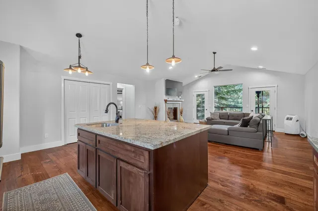 a view of a chair and table in the balcony