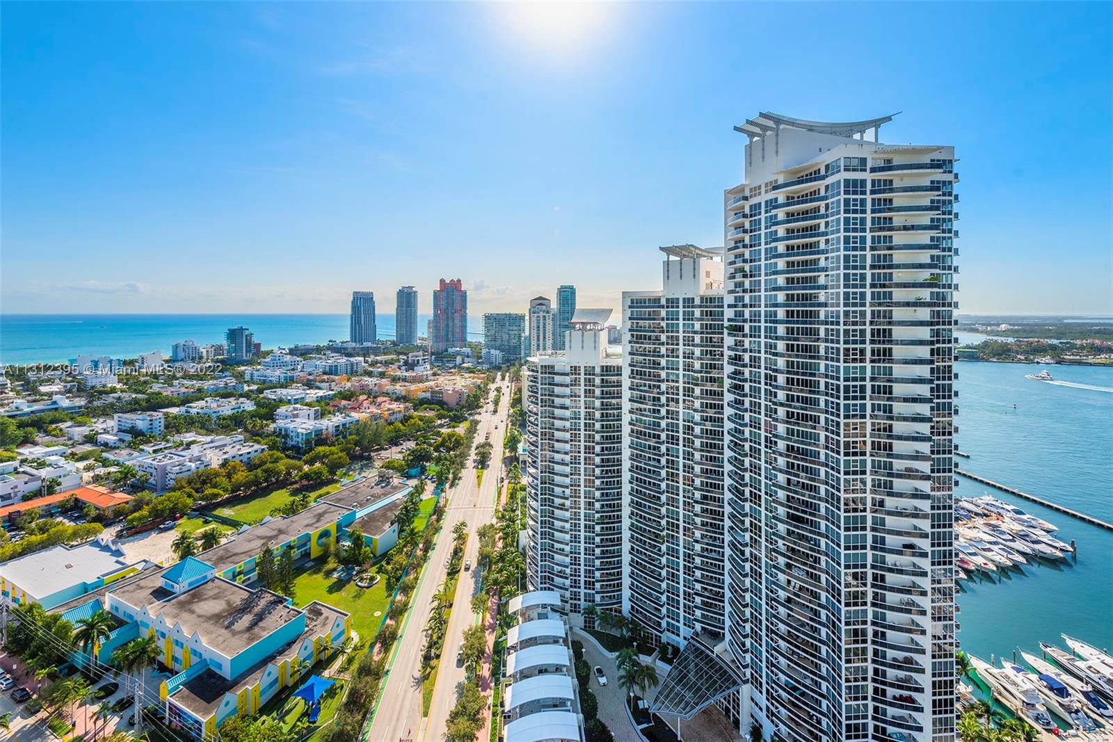 450 Alton Road, Unit 3010 Miami Beach, FL 33139 - Photo 40 of 66 a view of a city with tall buildings