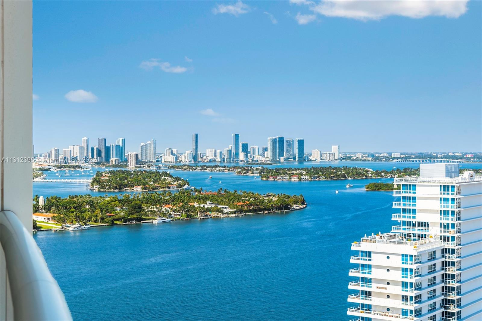 450 Alton Road, Unit 3010 Miami Beach, FL 33139 - Photo 4 of 66 a view of a city with tall buildings