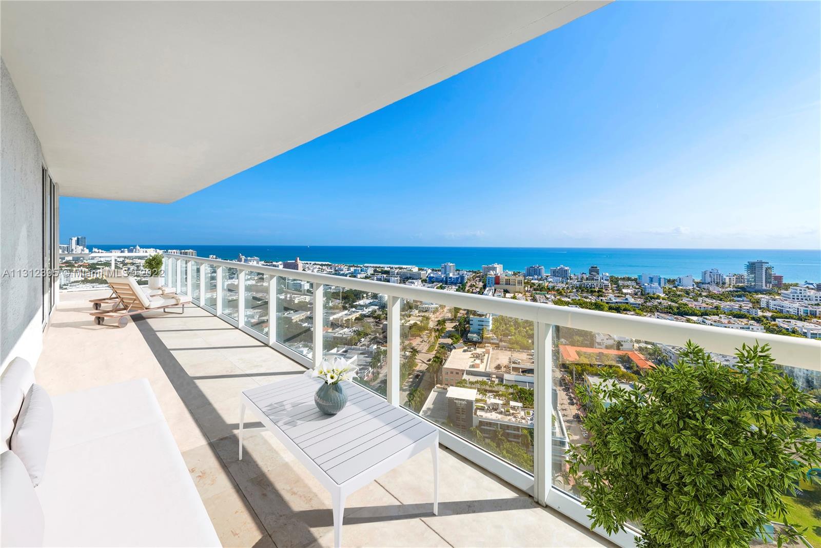 450 Alton Road, Unit 3010 Miami Beach, FL 33139 - Photo 9 of 66 a view of balcony with furniture
