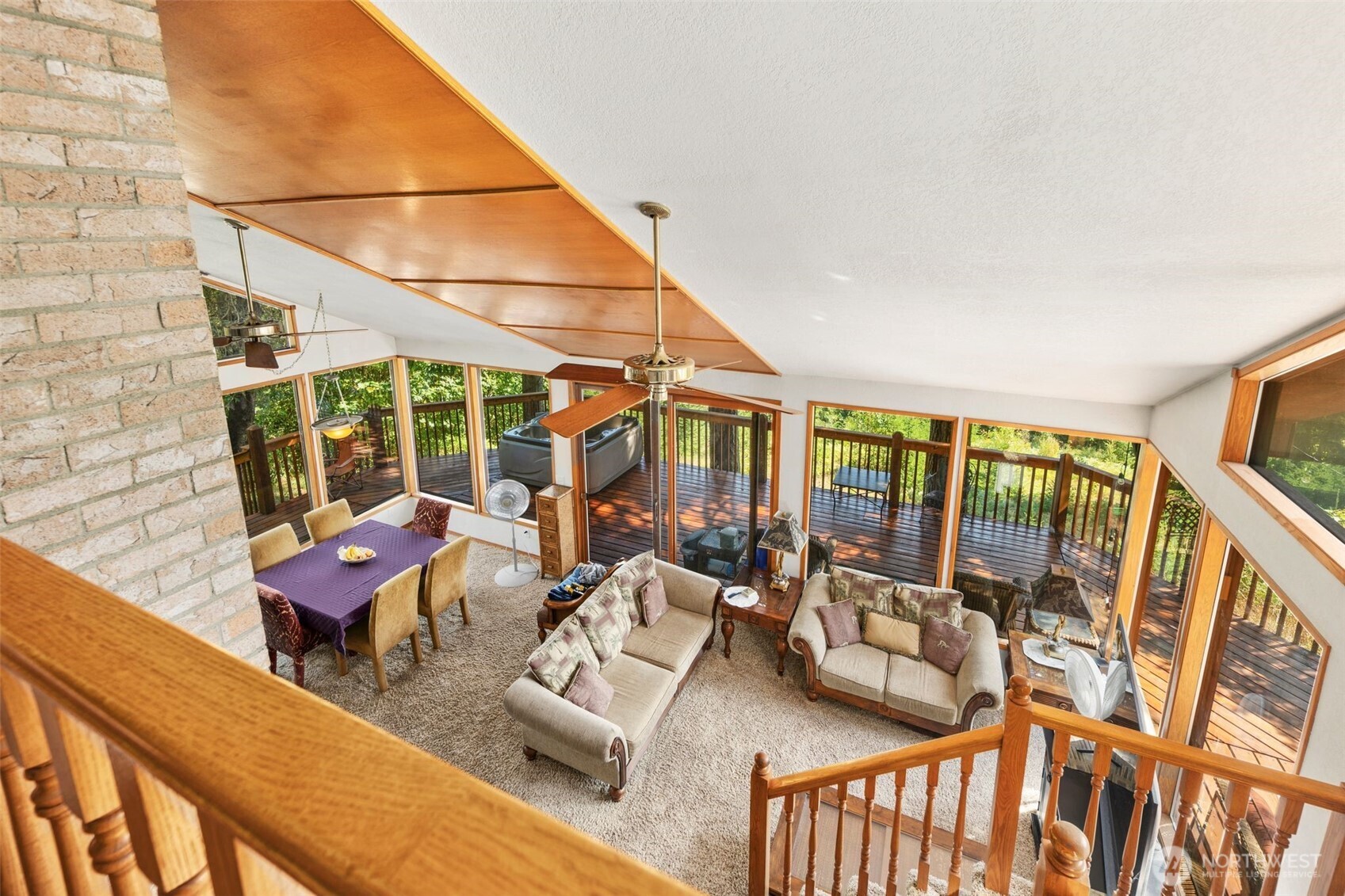428 Eagle Ridge Road Port Angeles, WA 98363 - Photo 15 of 40 a sitting area with furniture and wooden floor