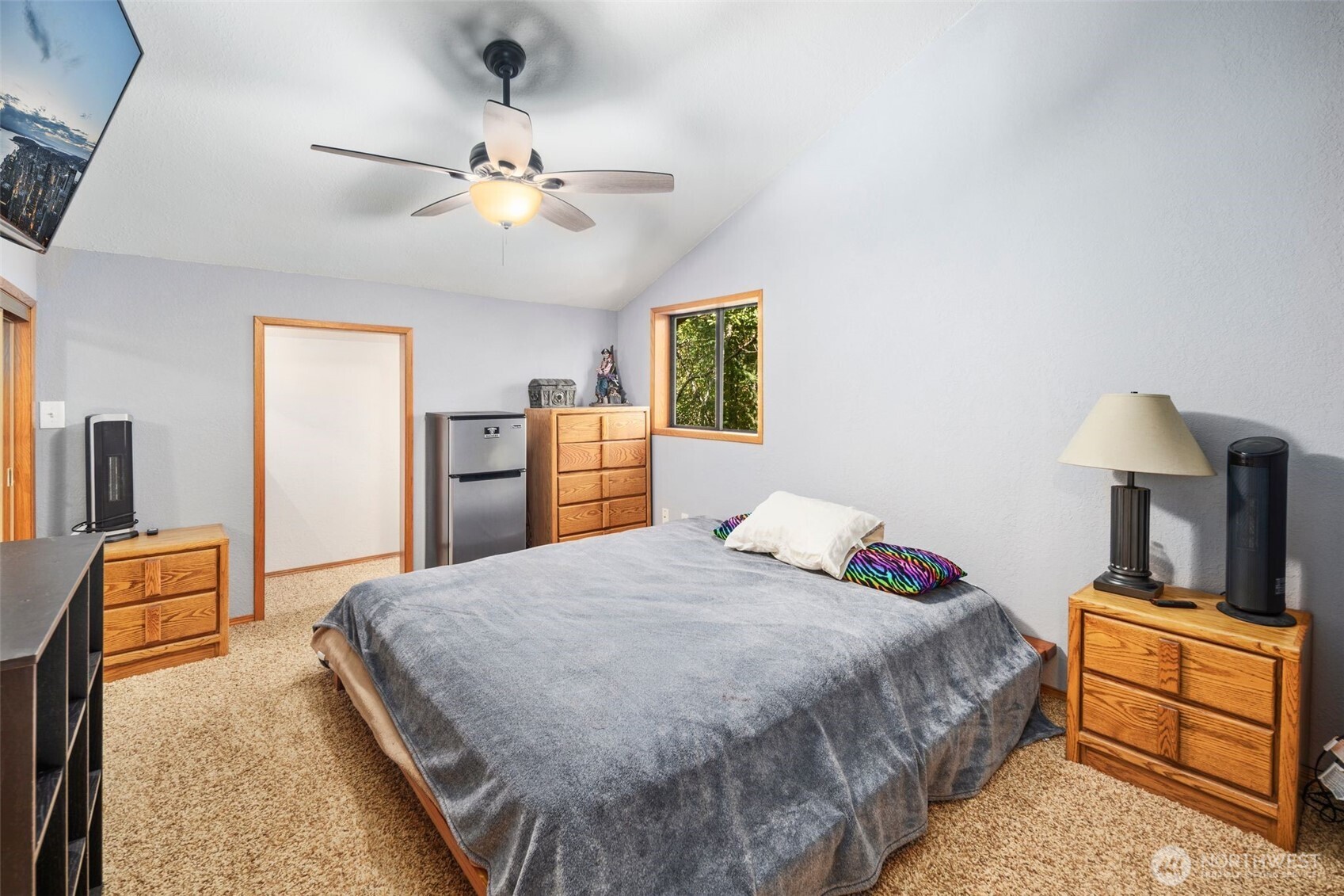 428 Eagle Ridge Road Port Angeles, WA 98363 - Photo 19 of 40 a bedroom with a bed and dresser