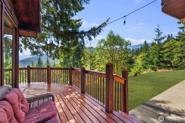 a balcony with wooden floor