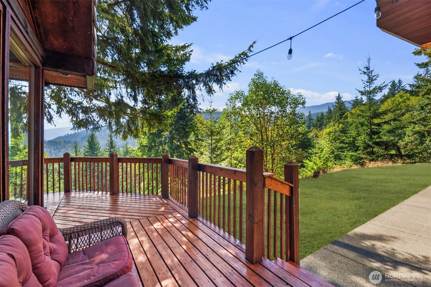 428 Eagle Ridge Road Port Angeles, WA 98363 - Photo 2 of 40 a balcony with wooden floor