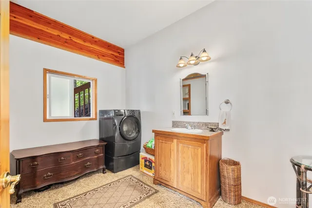 a bathroom with a sink and toilet