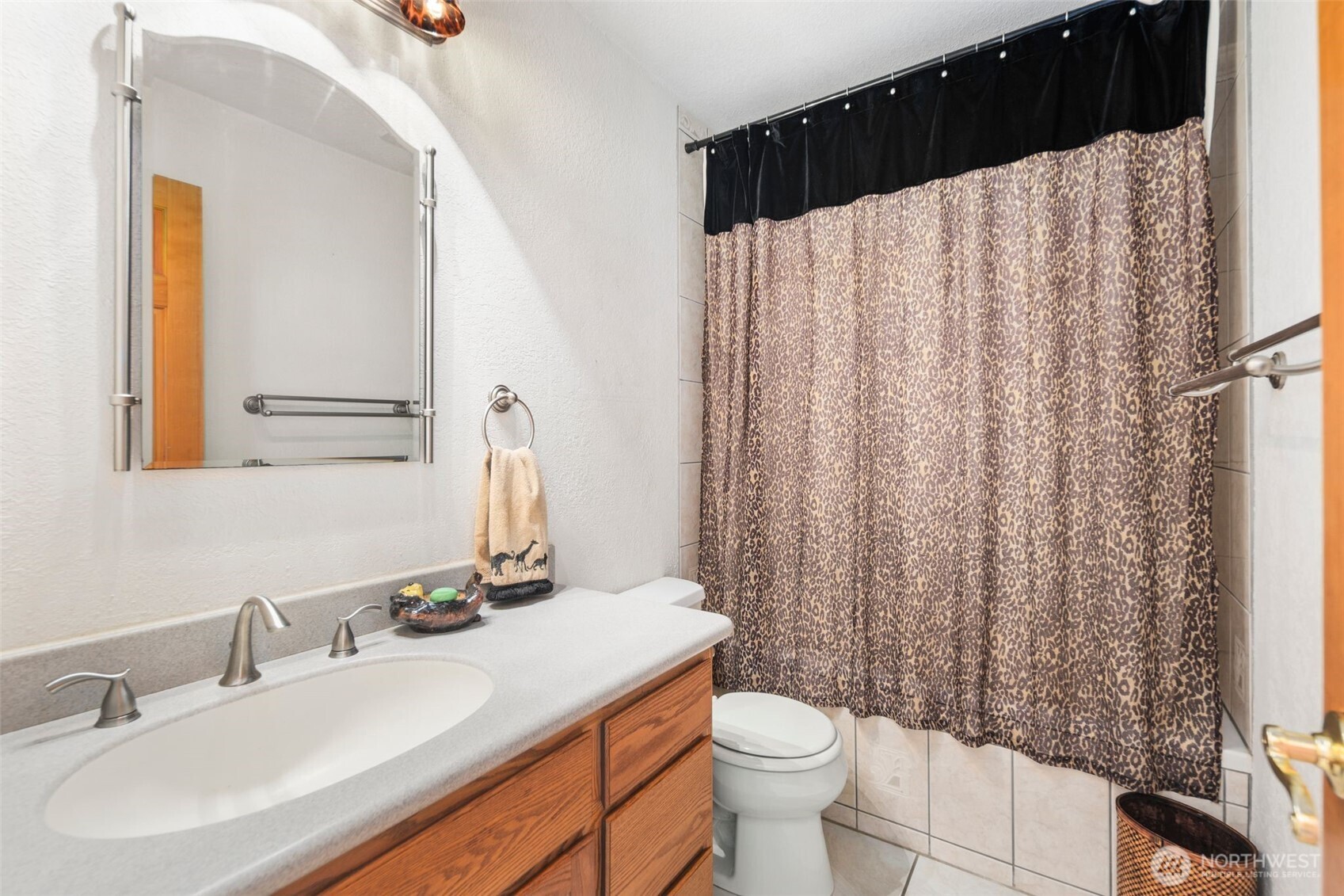 428 Eagle Ridge Road Port Angeles, WA 98363 - Photo 28 of 40 a bathroom with a sink and a mirror