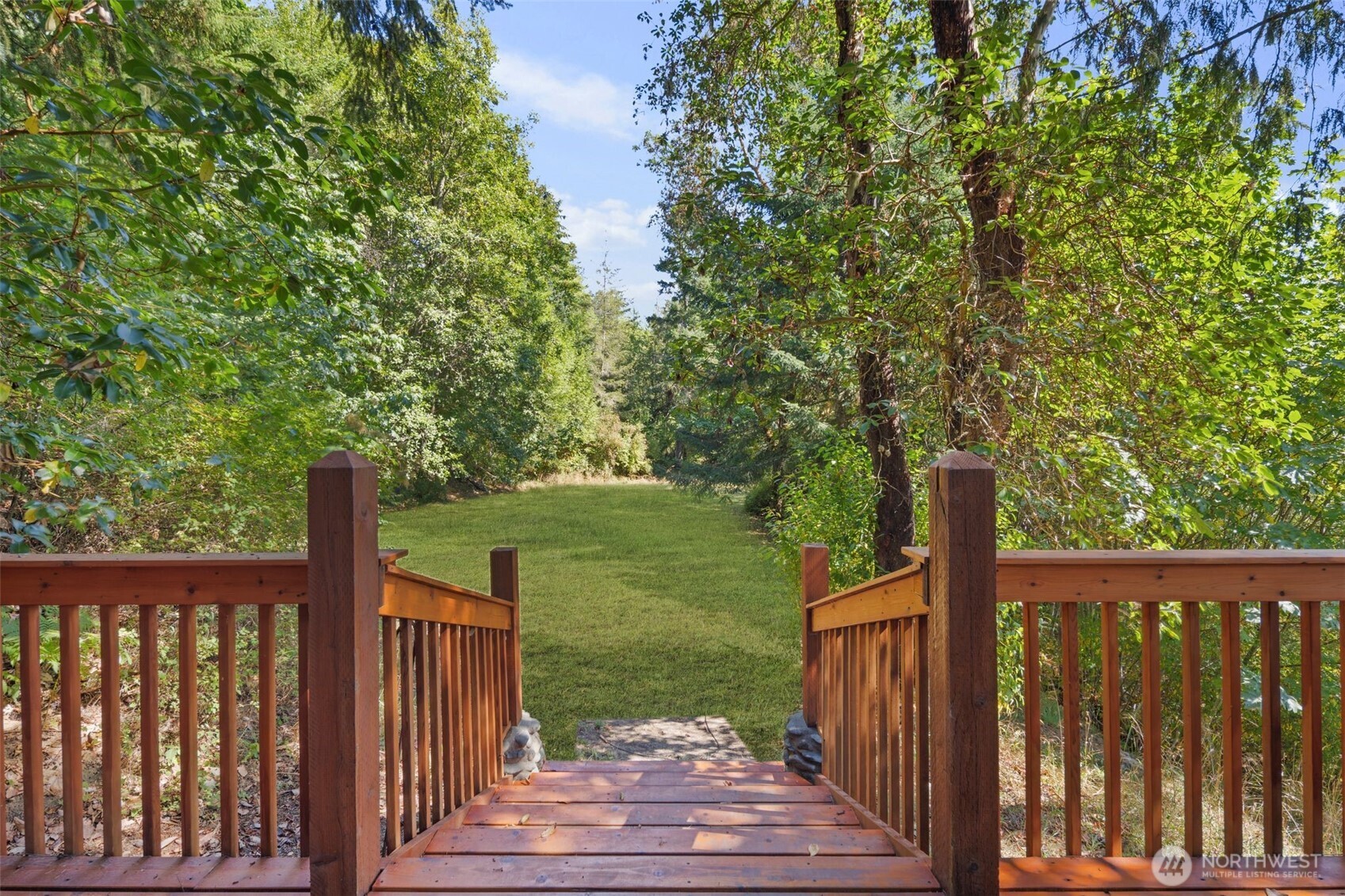 428 Eagle Ridge Road Port Angeles, WA 98363 - Photo 3 of 40 a view of a deck with a yard