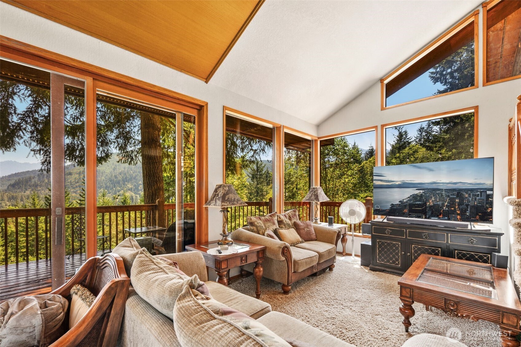 428 Eagle Ridge Road Port Angeles, WA 98363 - Photo 6 of 40 a living room with furniture and a flat screen tv