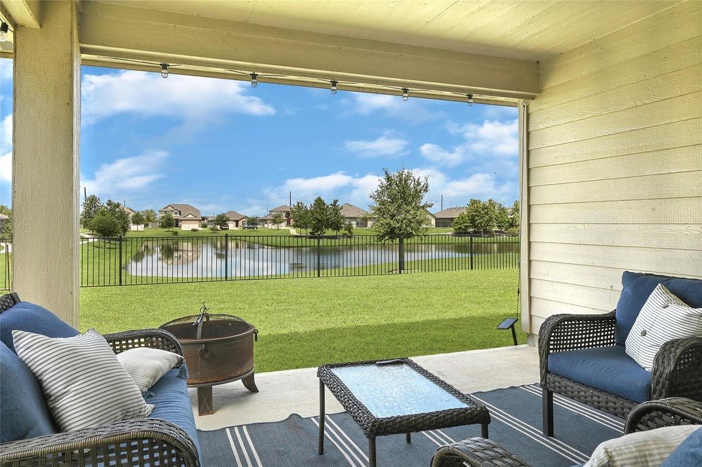 5422 Still Creek Ranch Drive Richmond, TX 77469 - Photo 1 of 28 a view of a patio with couches chairs and a table