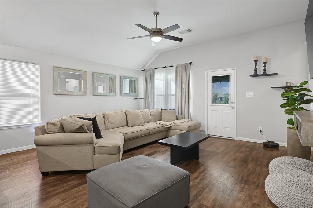 5422 Still Creek Ranch Drive Richmond, TX 77469 - Photo 11 of 28 a living room with furniture and a large window