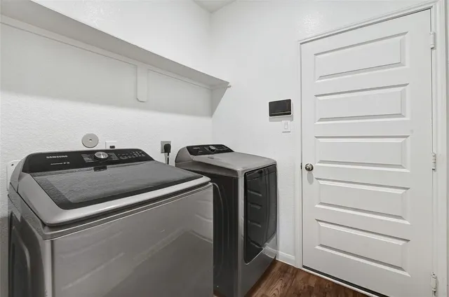 a utility room with dryer and washer