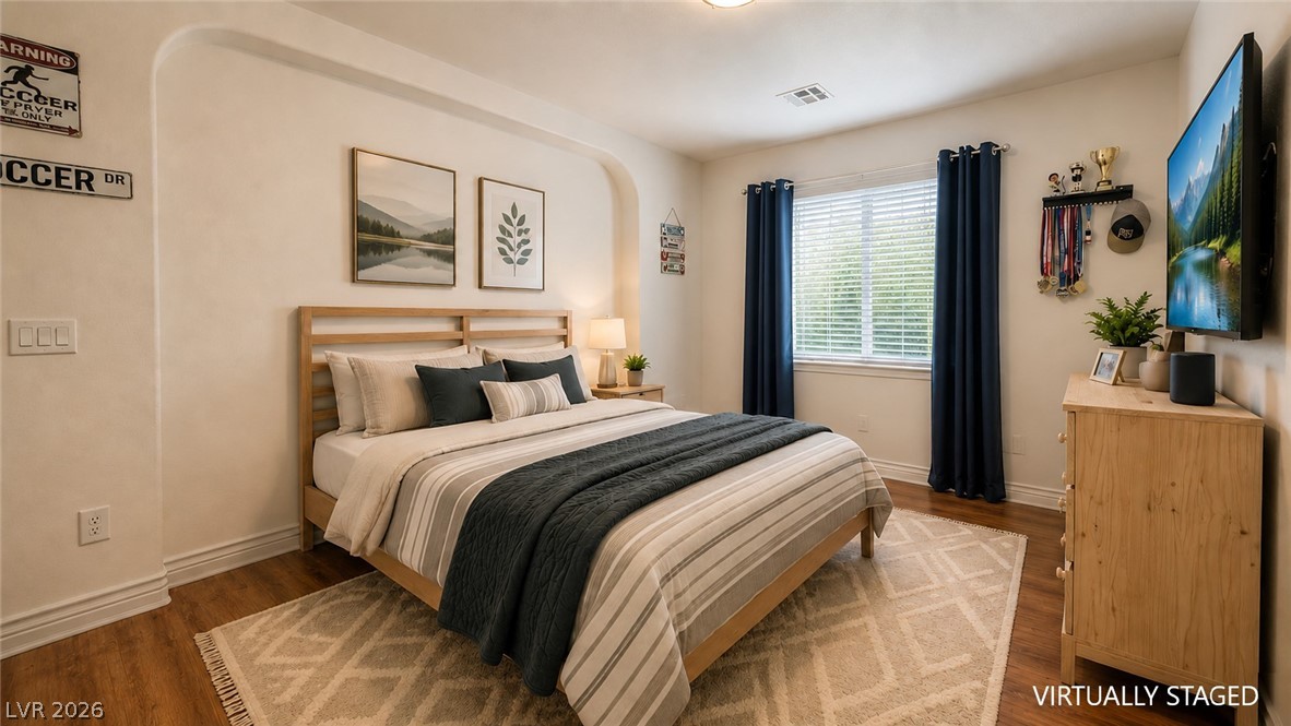 87 Tall Ruff Drive Las Vegas, NV 89148 - Photo 69 of 71 Well-lit and comfortable, this bedroom provides a quiet and private retreat for relaxation.