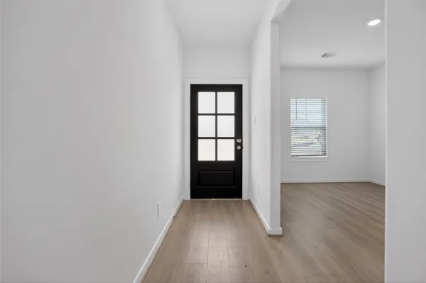 a living room with furniture and window