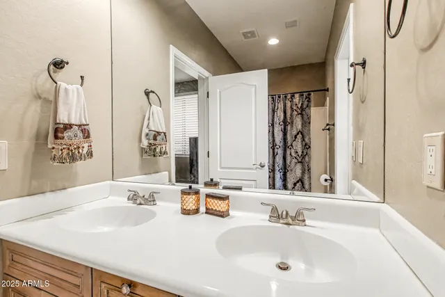 a view of an house with backyard and swimming pool