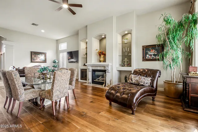 a living room with furniture or fireplace and a wooden floor