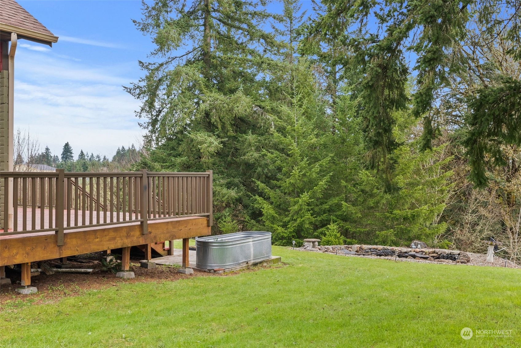 658 Spencer Road Toledo, WA 98591 - Photo 28 of 33 a view of a house with backyard and sitting area