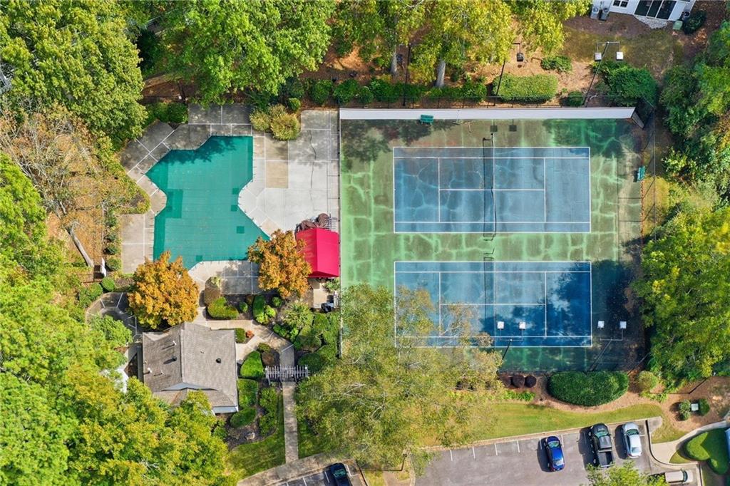 4053 Whitehall Way Alpharetta, GA 30004 - Photo 2 of 28 an aerial view of a house with a yard and a large tree