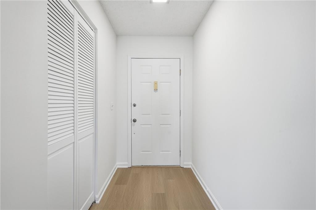 4053 Whitehall Way Alpharetta, GA 30004 - Photo 7 of 28 a view of hallway with closet