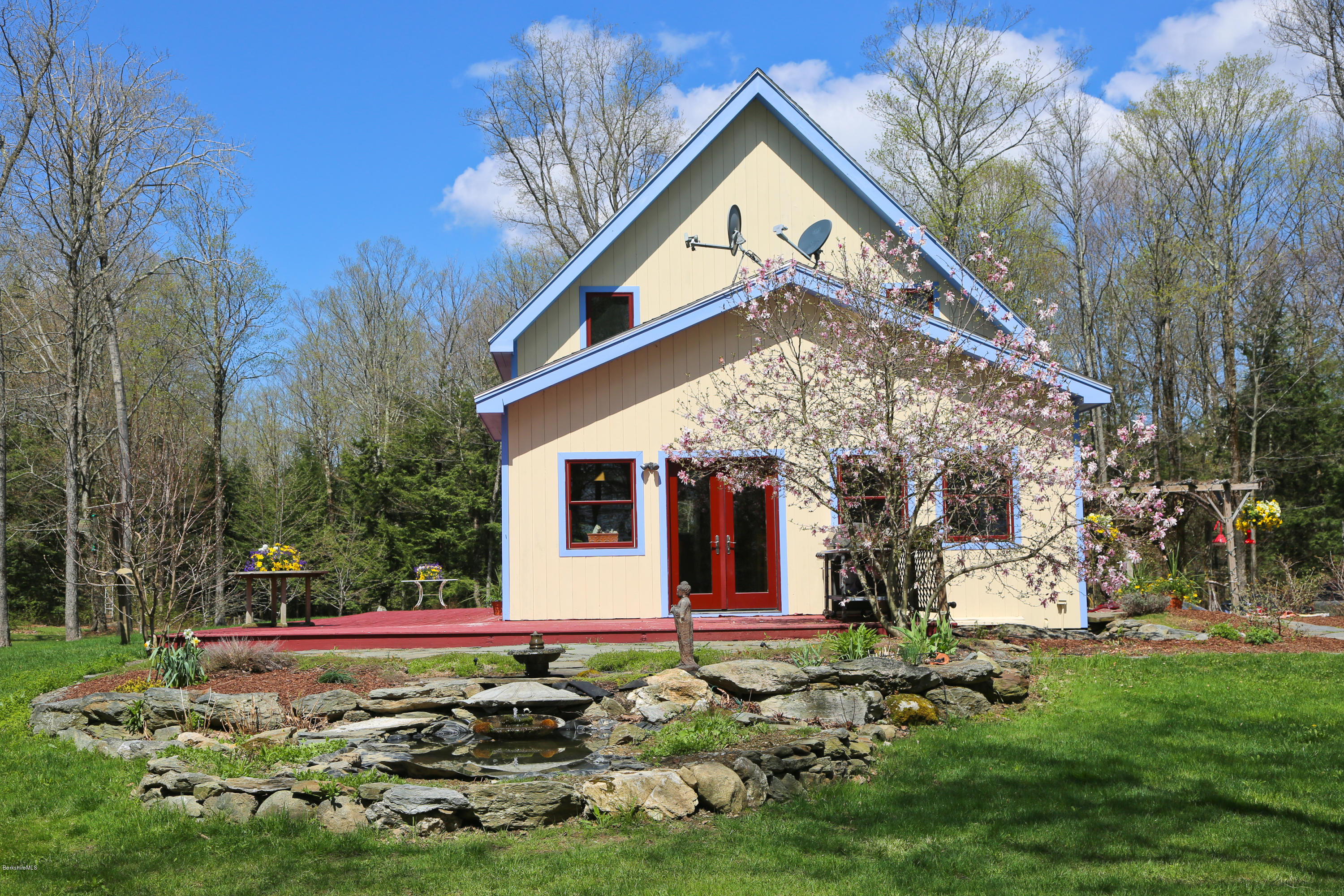 53 Maple Hill Road West Stockbridge, MA 01266 - Photo 5 of 22 a view of a house with backyard