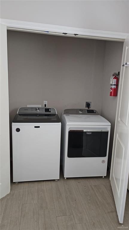1900 Jackson Street, Unit 4 Weslaco, TX 78599 - Photo 12 of 15 a utility room with dryer and washer