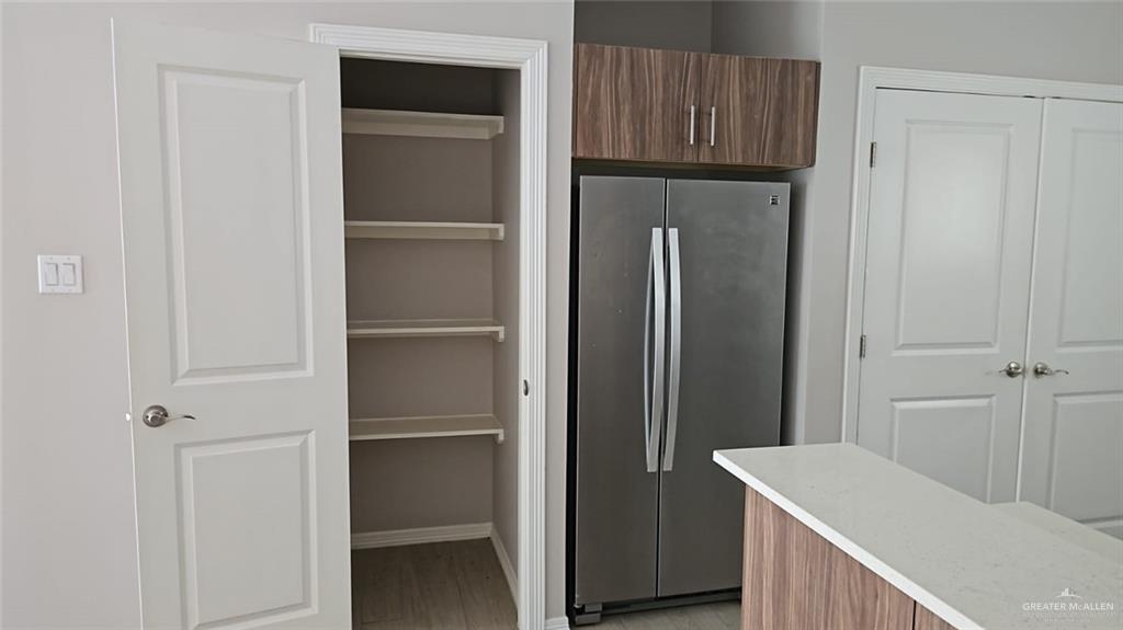 1900 Jackson Street, Unit 4 Weslaco, TX 78599 - Photo 6 of 15 a room with storage and utility