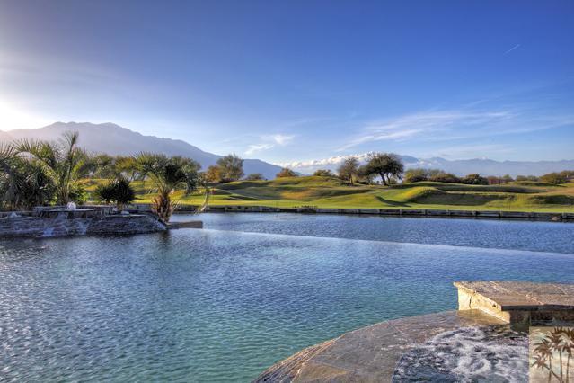 384 Loch Lomond Road Rancho Mirage, CA 92270 - Photo 19 of 25 a view of a lake with a mountain in the background