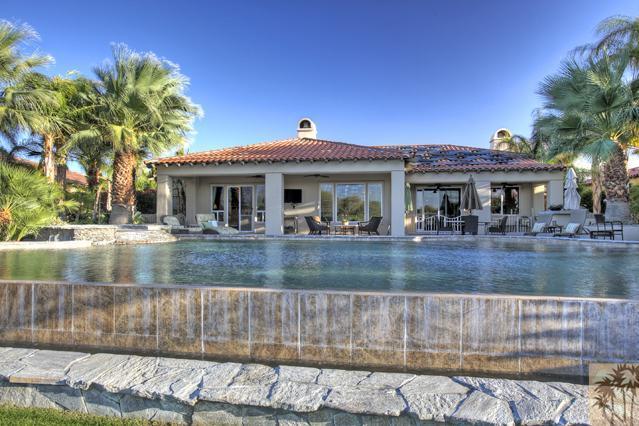 384 Loch Lomond Road Rancho Mirage, CA 92270 - Photo 20 of 25 a view of house with a swimming pool